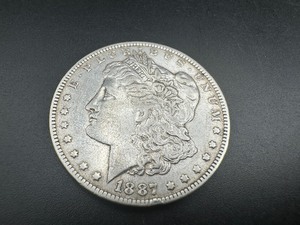 lot 49 image: 1887 O VF Morgan Dollar