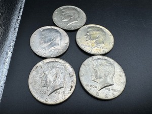 lot 61 image: Five 40% Silver Kennedy Halves