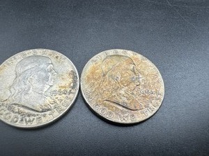 lot 63 image: Two Mid Grade Franklin Halves 1954 &1960D