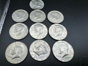 lot 65 image: Ten 40% Silver Kennedy Half Dollars