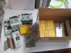 lot 8 image: Large lot of air nails and staples...