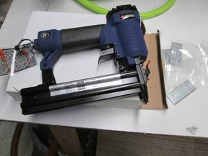 lot 17 image: New Campbell Hausfeld pin nail gun...