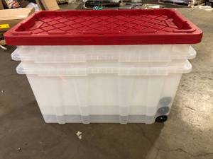 lot 34 image: Lot of HDX 77 Gal. Tough Storage Tote with Wheels in Clear with Red Lid     Customer Returns See Pictures