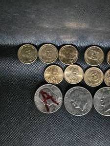 lot 107 image: 9-Presidential Dollars, 3-Ikes 72,72,72
