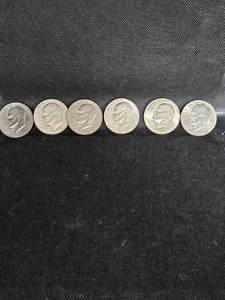 lot 117 image: 6-Ike Silver Dollars