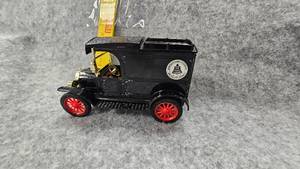 lot 75 image: Ertl American Telephone Coin Bank, Excellent Shape, has key