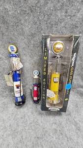 lot 139 image: Gas Pump Replicas-Pennzoil, Pontiac, and University of Kentucky
