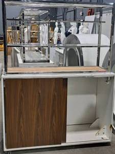 lot 27 image: 76 Rolling Display Shelf