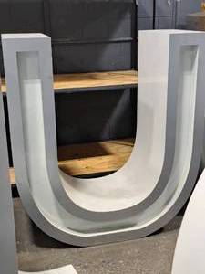 lot 56 image: 60 Metal Letter U
