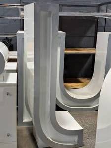 lot 58 image: 73-12 Metal Letter J