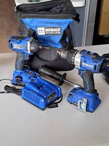 lot 296 image: Kobalt Cordless 14 Impact Driver and 12 DrillDriver Set with Case, (2) Batteries, (1) Charger, (1) Tool Handle and Tool Bag
