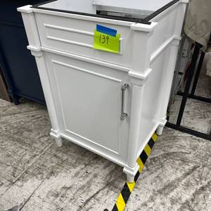 lot 139 image: Aberdeen 24 Vanity Base White Wood No Counter (slight damage)