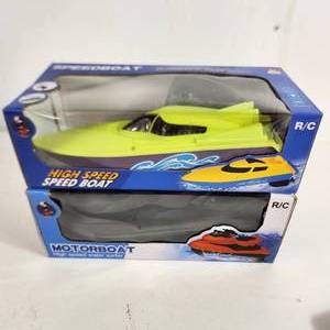 lot 45 image: Lot Of Two New RC Water Toys High Speed Boat And Jet SkiBoat Bright Yellow And Black