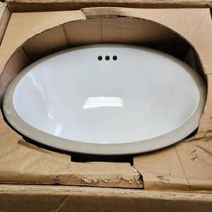 lot 66 image: Signature Hardware 15 Mangrove Porcelain Oval Undermount Bathroom Sink White