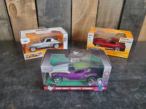 lot 8 image: Lot of 3 Cars Still in original Boxes never used  Flashy Joker, Bright Red Corvette, and Flames on the silver Corvette