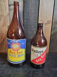 lot 12 image: 2 vintage amber glass beer bottles  Miller High Life Picnic Beer, and Walters Keg Beer