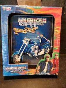 lot 56 image: Still in box never used American Chopper Mikeys Bike Clock