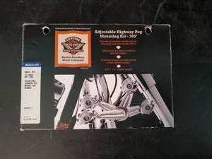 lot 82 image: Harley Davidson  Still in Box Adjustable Highway Pegs