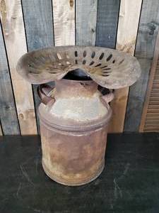 lot 84 image: Milk Can With Tractor Seat   Seat is not Attached