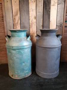 lot 102 image: 2 milk cans no lids great for display as plantersor garden art