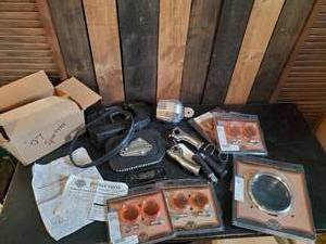 lot 109 image: Misc Lot of Harley Davidson Parts, Bullet Front Turn Signal Trim Ring,Headlamp trim ring, and others