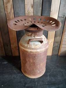 lot 114 image: Milk Can With Tractor Seat   Seat is not Attached