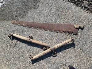 lot 143 image: Warrented Superior Saw in Good Condition and 2 Horse and Wagon Yokes
