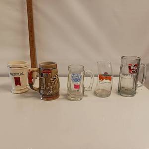 lot 22 image: A&W, Mich and Bud plus two more (5 mugs)