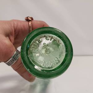 lot 32 image: Pine City, MN - 50s embossed Coke Bottle