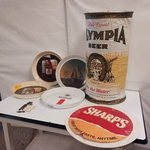 lot 41 image: 7pc Beer Collectibles, Olympia inflatable can, Schlitz serving trays , Misc.