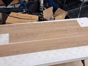 lot 326 image: Lot of (9 Boxes) 213.39-sq.ft. LVP Waterproof Rigid Core Luxury Vinyl Click Plank Flooring with Pad 5mmx7.15x47.75  23.71-sq.ft. GEN4129RIG 10-count ( 90 total items ) (Ale)