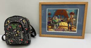 lot 5 image: Miniature Mickey Mouse Back Pack & Toy Story Framed Lithograph