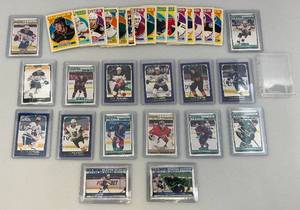 lot 26 image: Misc. Hockey Cards Some in Protective Sleeves Including Conner Mcdavid & More