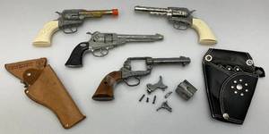 lot 128 image: Vintage Toy Cap Guns Including 1950s Hubley & Replica Western Pistol (Needs Repair) & More