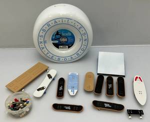 lot 169 image: Misc. Tech Deck Miniature Skateboards & More In Skateboard Wheel Carrying Case