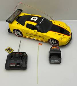 lot 185 image: New Bright RC Remote Controled Corvette 18 C6R With Battery And Charger (WORKS)