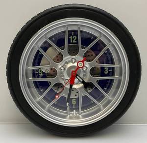 lot 194 image: 13 12 Man Cave Tire Wall Clock (Works)
