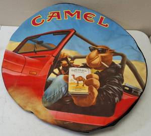 lot 14 image: Camel Cigarettes Memorabilia (1) Camel  Joe Cool Spare Tire Cover for a Jeep  (1) Stack of Camel Coasters (View Photos)