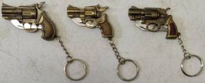 lot 18 image: (3) Miniature Metal Gun Keychains  Fold Up Knives