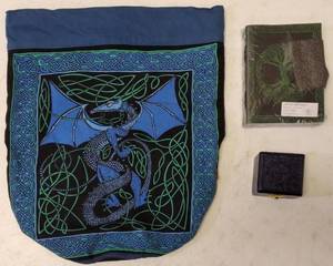 lot 19 image: Stylish Assortment - (1) Cloth Drawstring  Backpack - Dragon on the Front (1) Journal - Tree of Life Design & (1) Blue Wooden Trinket Box (View Photos)