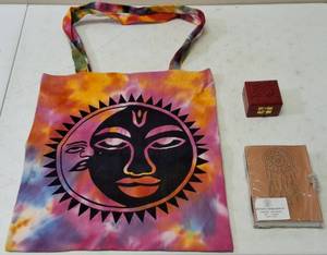 lot 20 image: Fashionable Assortment (1) Cloth Tye Dye Shoulder Bag - Sun & Moon Print on Front & Back (1) Journal - Dream Catcher on the Cover (1) Brick Red Trinket Box - Wooden (View Photos)