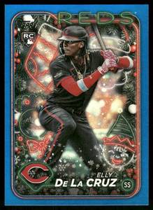 lot 59 image: Elly De La Cruz RC 2024 Topps Holiday Blue Metallic SP #H102 Cincinnati Reds  Baseball Card