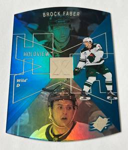 lot 160 image: Brock Faber RC Die Cut 2023-24 Upper Deck Extended Series SPX #21 Rookie Minnesota Wild Hockey Card