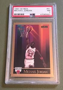 lot 32C image: Michael Jordan PSA 7 NM 1990 Skybox #41 Basketball Card