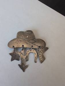 lot 13A image: Mexican Silver Cowboy Brooch
