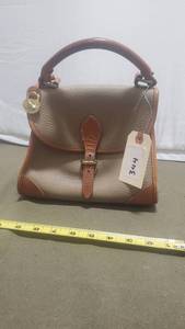lot 23X image: Dooney & Bourke All Weather Leather Bag  344