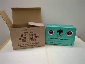 lot 401 image: Vintage HoL-DeM Electric Fencer Model 57 with Box
