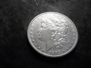 lot 24 image: 1892 O Morgan Silver Dollar