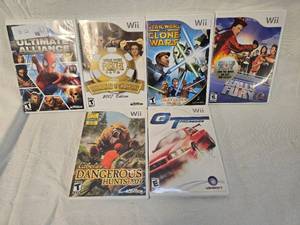 lot 12 image: (6) Wii Games