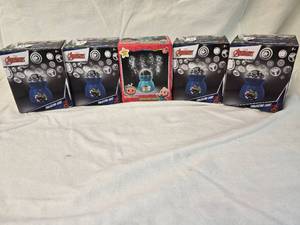 lot 36 image: (4) Avengers Projector Lights, (1) Cocomelon Light